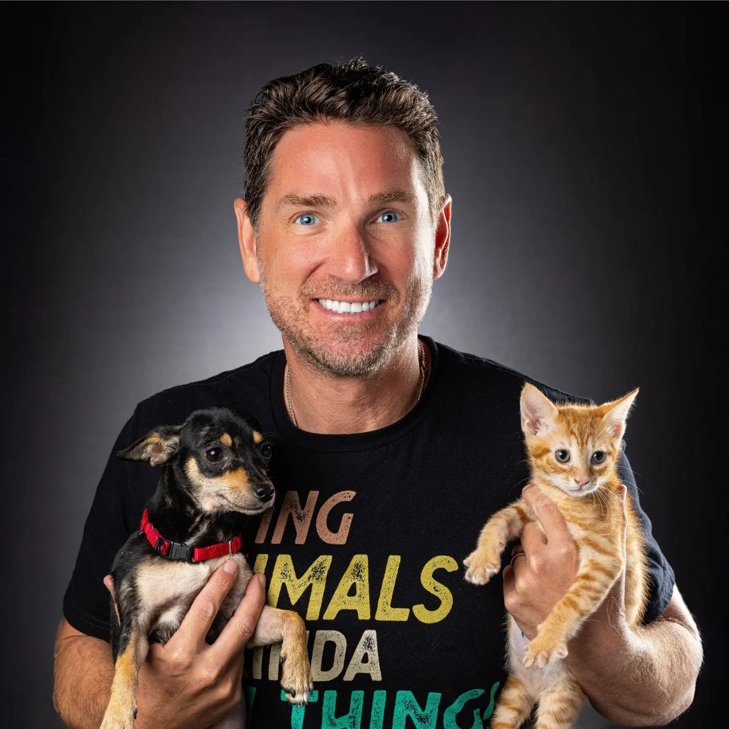 Jason Gluck with pups-cropped