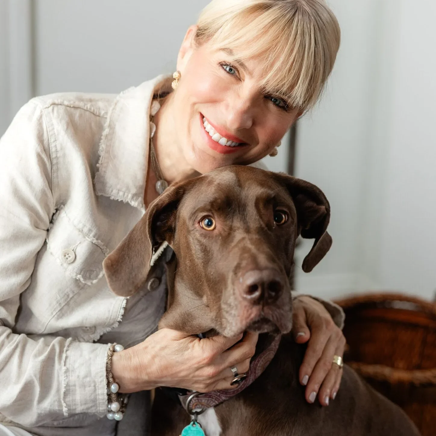 Laura Maloney photo with brown dog-cropped